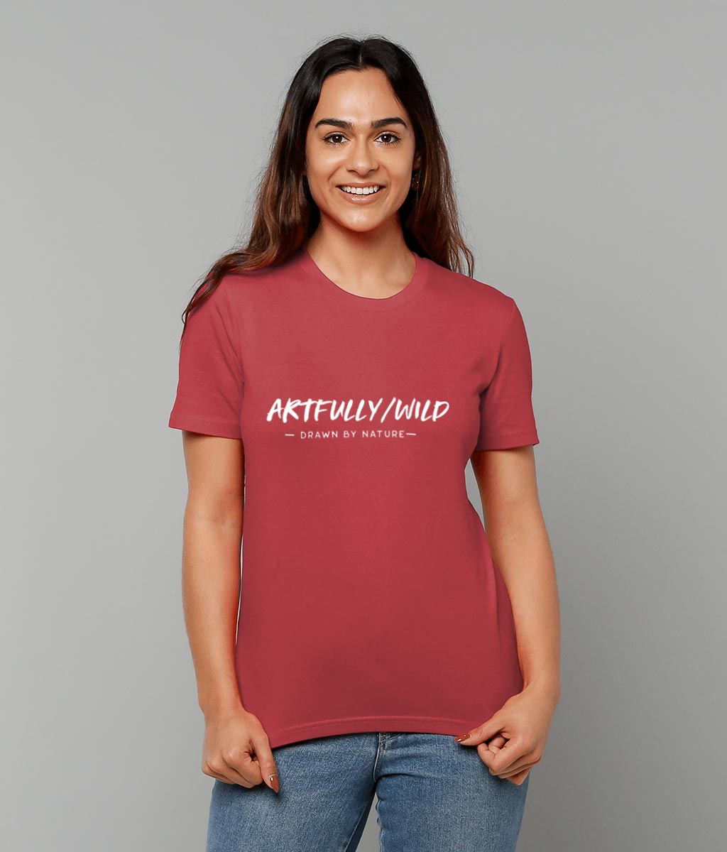 Female model wearing 'ARTFULLY WILD. DRAWN BY NATURE' Organic Cotton Red T-Shirt. Unisex/Men/Women. Printed with eco-friendly water-based Inks. Sustainable Ethical Clothing by Artfully/Wild.