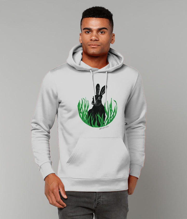 Male model wearing ‘HARE IN THE GRASS’ Classic Grey Marl Hoodie. Unisex/Men/Women. Certified Organic Cotton. Printed UK with water-based Inks. Sustainable Eco-friendly Clothing Original Illustration by Artfully/Wild.