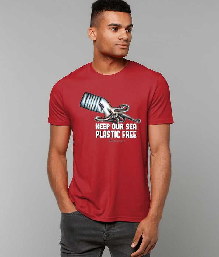 Male model wearing 'OCTOPUS BOTTLE – KEEP OUR SEA PLASTIC FREE' Print on Bright Red Organic T-Shirt. Unisex/Women/Men. Sustainable Clothing. Original Illustration by Artfully/Wild for Ocean Lovers